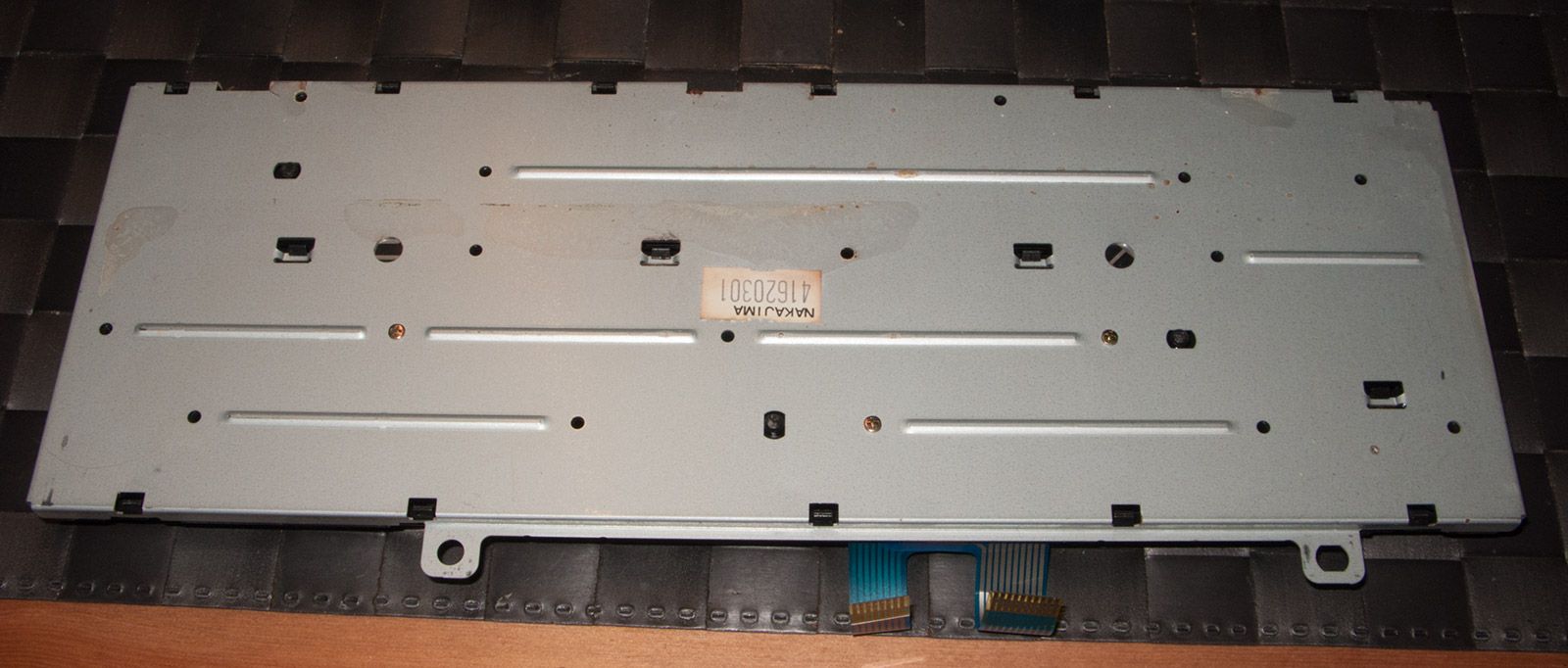 removing crews to go at the Amstrad Notepad NC200 keyboard